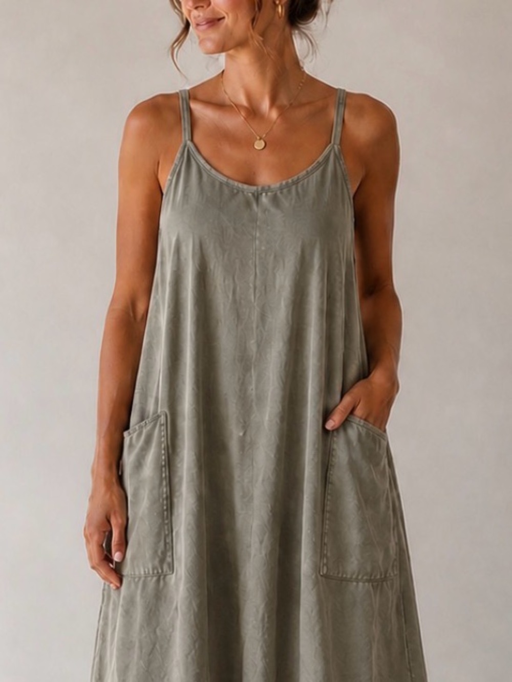 New in brand. Hot shot layered style dress. Spaghetti strap & pockets size Large